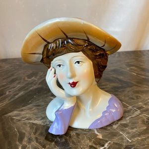 Similar to a head vase, beautiful ceramic bust